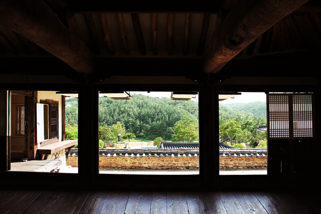 Wide opening windows keep the houses cool